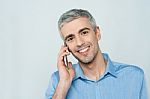 Middle Aged Man Talking On Cell Phone Stock Photo
