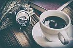 Morning Coffee, Desk Clock On The Dark Wooden Stock Photo