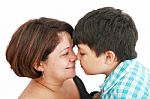 Mother And Son About To Kiss Stock Photo