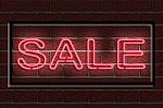 Neon Sale Sign Stock Photo