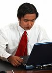 Office Worker Using Laptop Stock Photo