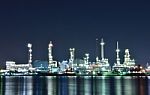 Oil Refinery In The Night Stock Photo