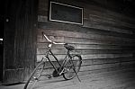 Old Bicycles And Wooden Stock Photo