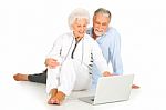 Old Eldery Couple With Laptop Stock Photo