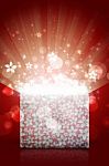 Open Magic Gift Box With Red Background Stock Photo