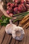 Organic Garlic On Wood Stock Photo