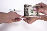 Payment Of A Drug Dose Stock Photo