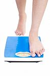 person standing on Weight Scale Stock Photo