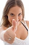 Pleased Female With Thumbs Up Stock Photo