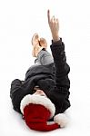 Pointing Female Wearing Christmas Hat Stock Photo