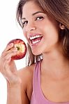 Portrait Of A Healthy Girl Smiling With Apple Stock Photo