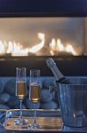 Portrait Of Champagne By The Fire Place Stock Photo