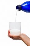 Pouring Milk In Glass Stock Photo