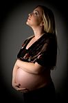 Pregnant Female Looking Up Stock Photo