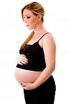 Pregnant Lady Standing Stock Photo