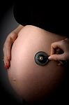 Pregnant Lady With Stethoscope Stock Photo