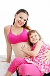 Pregnant Woman With Her Daughter Stock Photo