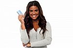 Pretty Woman Showing Credit Card To Camera Stock Photo