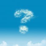 Question Mark Shaped Cloud In A Bright Blue Sky Stock Photo