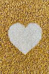 Rice Grains In Heart Shape  Stock Photo