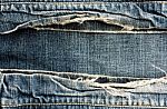 Ripped Vintage Jeans Stock Photo