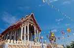 Samutprakarn, Thailand - July 19: Thai Buddhist Decorate Temple With Thailand Flag And Yellow Buddhism Symbol Flag To Celebrating On Asalha Puja Day Or Asalha Bucha Day Before Khao Phansa Day Stock Photo