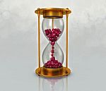 Sand Clock And Red Heart Stock Photo