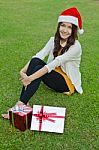 Santa Claus Hat With Red Christmas Gift Box