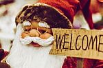 Santa Claus Statue Holding The Welcome Sign Stock Photo