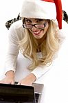 Santa Hat Woman Using Laptop