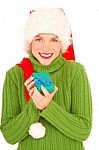 Santa Woman With Gift Stock Photo