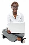Seated Business Lady Using Laptop