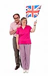 Senior Couple Holding UK Flag Stock Photo