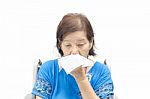 Senior Woman Blowing Her Nose Stock Photo