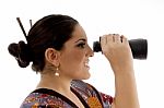 Side Pose Of Female Watching Through Binocular Stock Photo