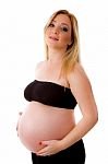 Side View Of Beautiful Pregnant Woman Stock Photo