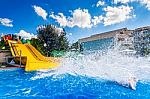 Slide And  Water Splash Stock Photo