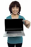 Smiling Asian Woman Pointing Laptop Stock Photo