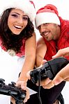 Smiling Couple Playing Video Game Stock Photo