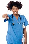 Smiling Lady Doctor Pointing You Out Stock Photo