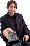 Smiling Man With Remote Control Stock Photo