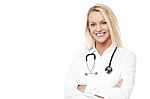 Smiling Pretty Doctor Posing Over White Stock Photo