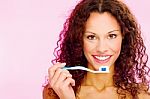 Smiling Woman And Teeth Brush Stock Photo