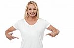 Smiling Woman Pointing Her Stomach Stock Photo
