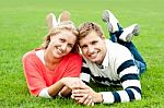 Smiling Young Couple In Outdoor Stock Photo