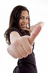 Smiling Young Woman Showing Thumb Up Stock Photo