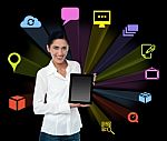 Smilng Woman With Tablet And Colourful Icons Stock Photo