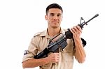 Soldier Posing With Gun Stock Photo