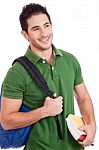 Student Carrying Bag And Books Stock Photo