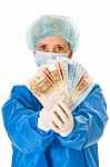 Surgeon Holding Banknotes
